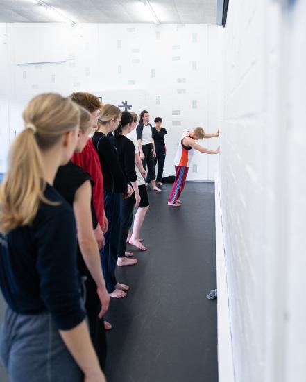 Dancers beside the wall with Lewis Cooke