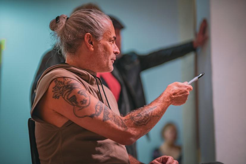 Photo: Mariia Solodiankina Giorgio Convertito looking to the side, holding a pencil in his hand