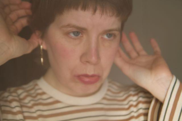 Photo: Laura Jantunen A blurry head shot of Laura Jantunen, who has a sad expression on her face.