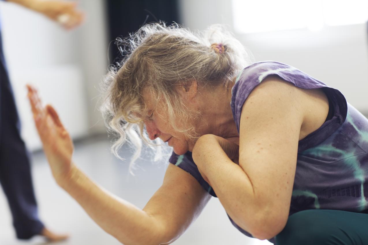 A close up of a senior dancing