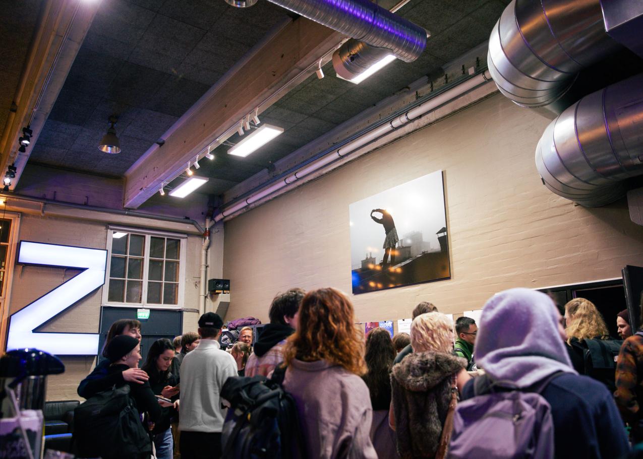Audience in the foyer of Zodiak Stage
