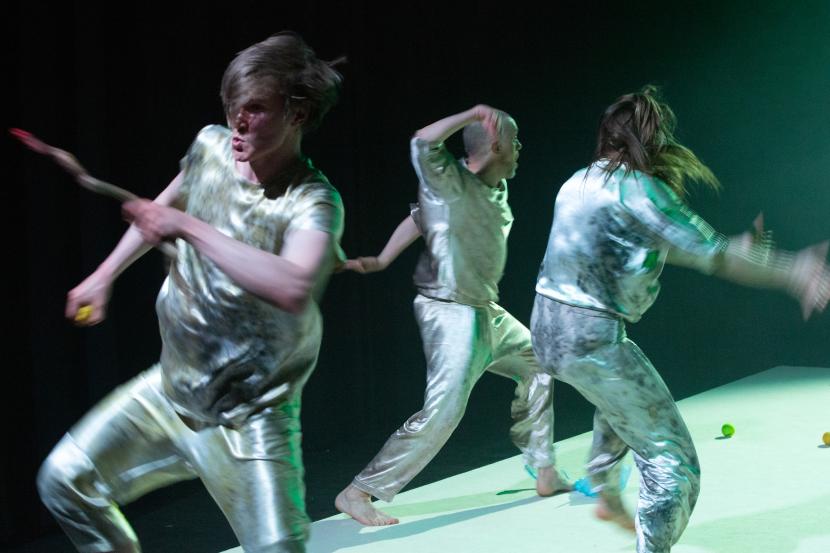 Johannes Purovaara dancing in the piece "Void" with two other dancers