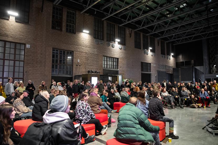 Audience listening to a conversation